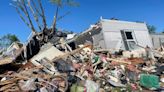 Storm-battered South is again under threat. A boy swept into a drain fights for his life