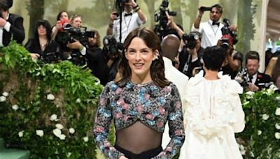 Riley Keough Stuns on the Met Gala Red Carpet with Daring Crop Top Ensemble