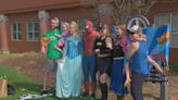 Community members dress as favorite characters during charity walk