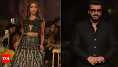 Amidst breakup rumors, Arjun Kapoor protects Malaika Arora from being mobbed at an event | Hindi Movie News - Times of India