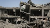 Airstrike kills 27 in central Gaza and fighting rages as Israel's leaders are increasingly divided