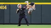 Behold This Backflipping, Taser-Fighting, Ballpark Crasher