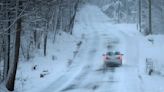 Winter storms dump snow on both US coasts as icy roads make for hazardous travel