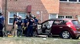 Woman injured after car hits Southeast DC apartment building