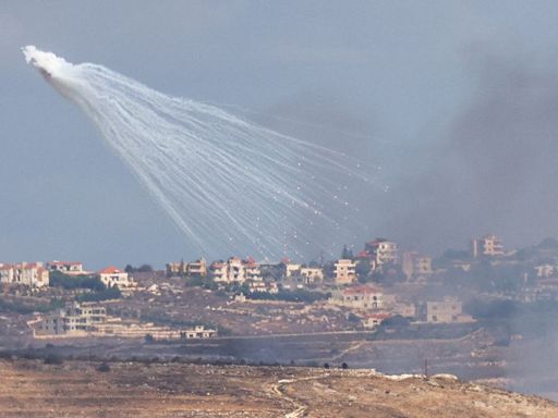 Israel reinforces military presence in Lebanon as Hezbollah reports clashes with troops