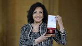 Dame Shirley Bassey admits she 'forgot to curtsy' after being overcome by nerves receiving honour from King