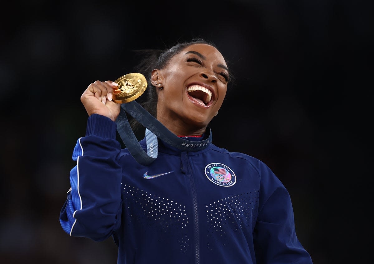 Olympics LIVE: Simone Biles claims seventh gymnastics gold as boxer Imane Khelif wins again amid gender row