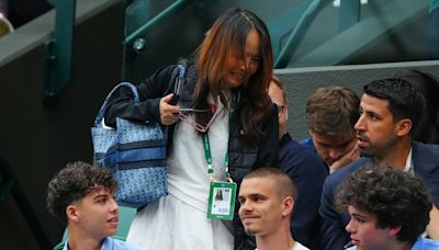 Raducanu's mum squeezes past Romeo Beckham to watch daughter triumph