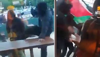 Gang waving Palestine flags beat lone pubgoer in more chaos on UK streets