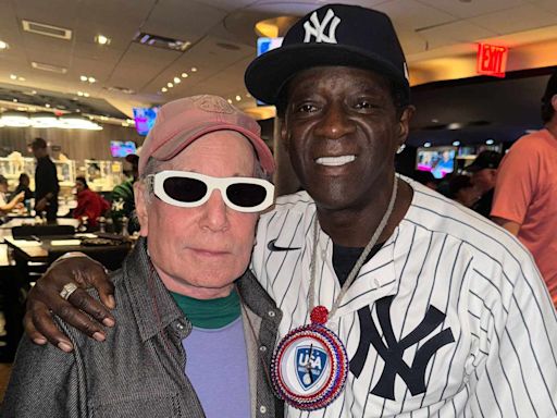 Flavor Flav Meets 'Icon' Paul Simon and Lets Him Try on His Sunglasses: 'This Is a Dream Come True'