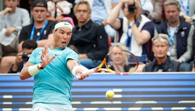 Nadal, Ruud save match point to make doubles semi-finals