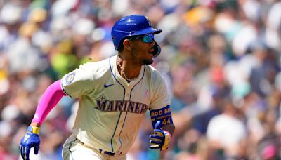 Mariners use homers from Julio Rodríguez and Mitch Garver to top A's 8-4