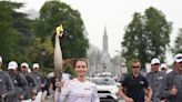 The Olympic torch flirts with the clouds in Hautes-Pyrénées