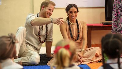 Meghan Markle and Prince Harry Are All Smiles on First Nigeria Trip