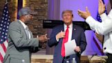 Trump blasts immigrants for taking jobs as he courts voters at a Black church, MAGA event in Detroit