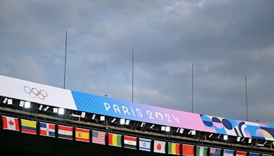 You won't believe the view of the Eiffel Tower from the Olympic beach volleyball stadium