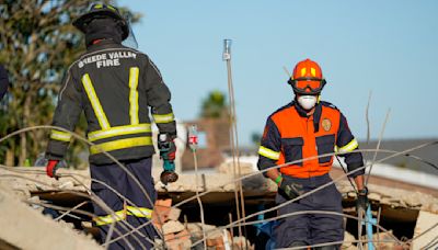 Hope fades for dozens missing days after South Africa building collapse as death toll rises to 12