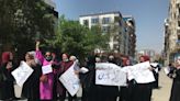 Protests as U.N. hosts meeting on "how to engage with the Taliban"