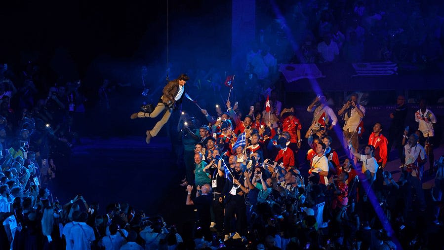 Tom Cruise crashes Paris Olympics closing ceremony with thrilling rappel, skydiving stunt