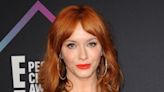 Christina Hendricks Is 'Bringing the Heat' in 'Poor Things'-Inspired Black Dress With Lace Insets