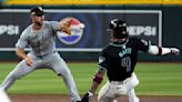 White Sox score tying run after intentional balk, beat Diamondbacks 9-2 for rare road win