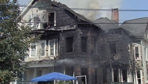 11 firefighters injured as raging blaze rips through Lowell home