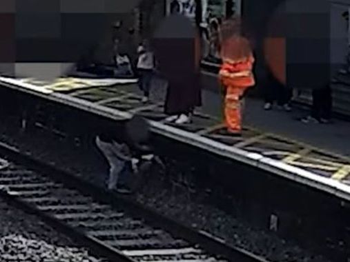 LNER releases footage showing moment child was rescued from rail track seconds before train passed through