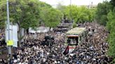 Mourners begin days of funerals for Iran’s president and others killed in helicopter crash