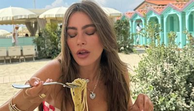 Sofia Vergara, 52, flashes chest, digs into HUGE plate of pasta