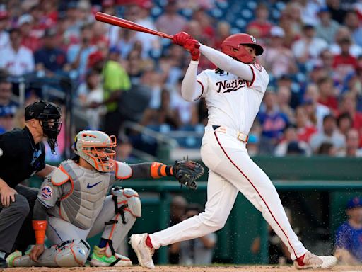 Top prospect James Wood singles in his first major league at-bat for the Nationals against the Mets