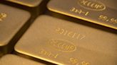 Gold extends record rally on Fed rate-cut bets, softer dollar