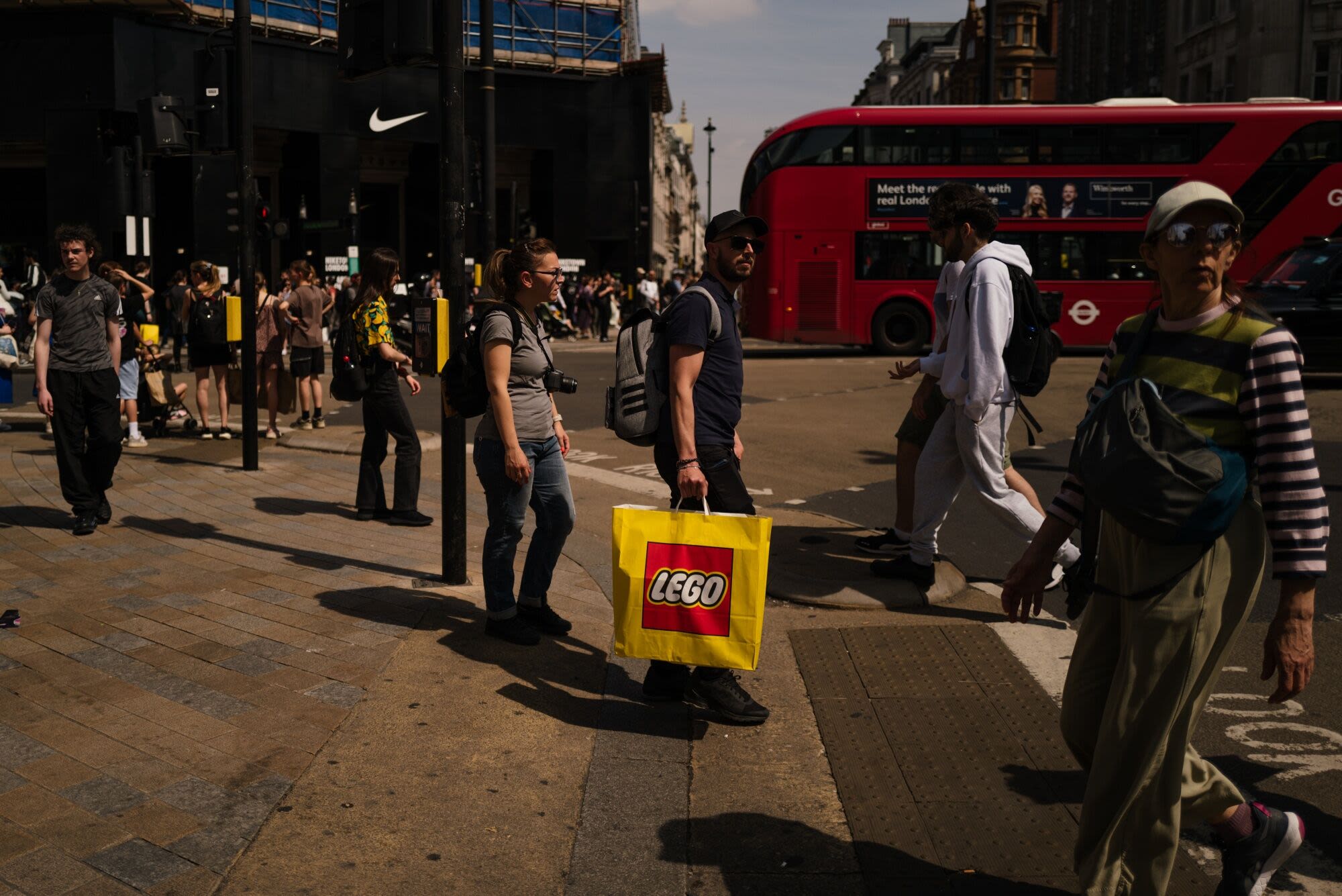 UK Economy Grew Faster Than Expected as Consumers Spent More