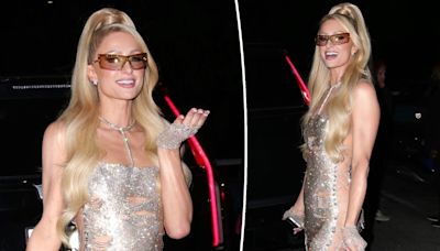 Paris Hilton is the ‘It Girl blueprint’ in laced-up sequined dress while previewing new album