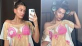 Hailey Bieber Shows Off Bikini Body with Joke T-Shirt While Getting Her Glam Done