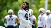 Kamara skips final minicamp practice over deal