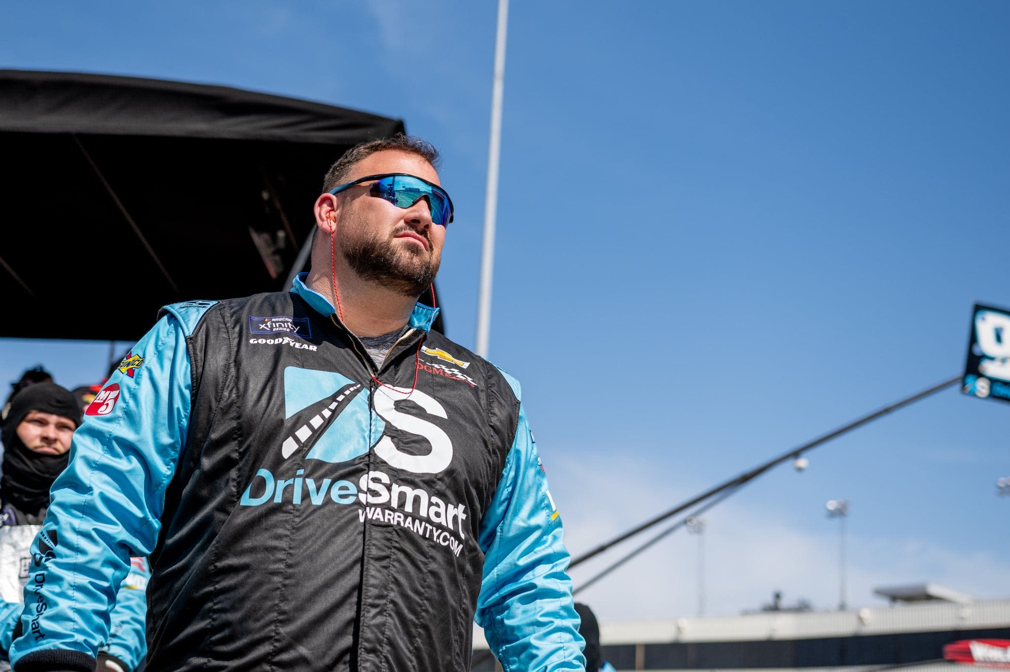 NASCAR crew member and TV extra, Pekin native a renaissance man with many uniforms