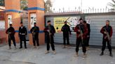 Pakistan election: Security officer dies after shots fired at 'polling station'