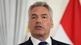 Austrian chancellor to remain in government coalition despite his minister's controversial EU vote