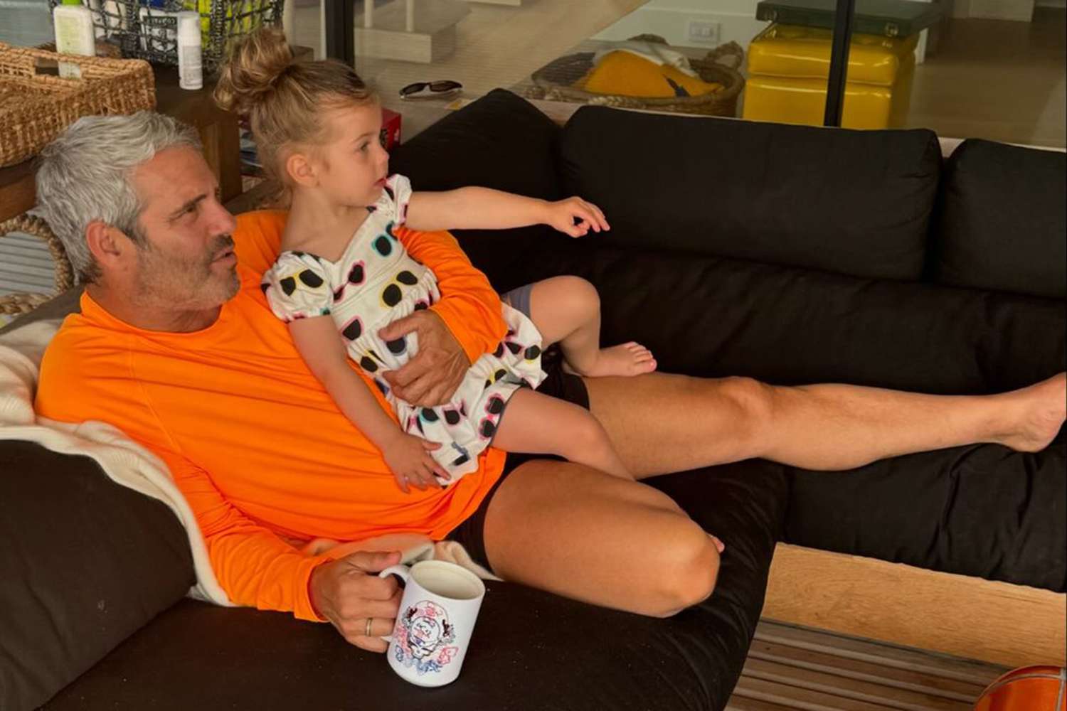 Andy Cohen Shares Sweet Snap Watching the Olympics with 2-Year-Old Daughter Lucy