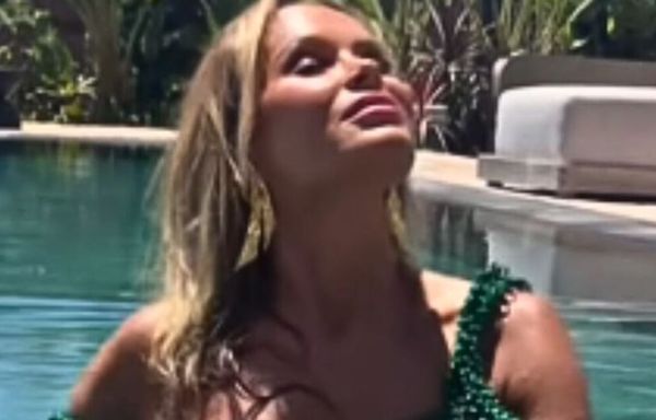 Amanda Holden shows off ageless figure in green bikini in glam poolside video