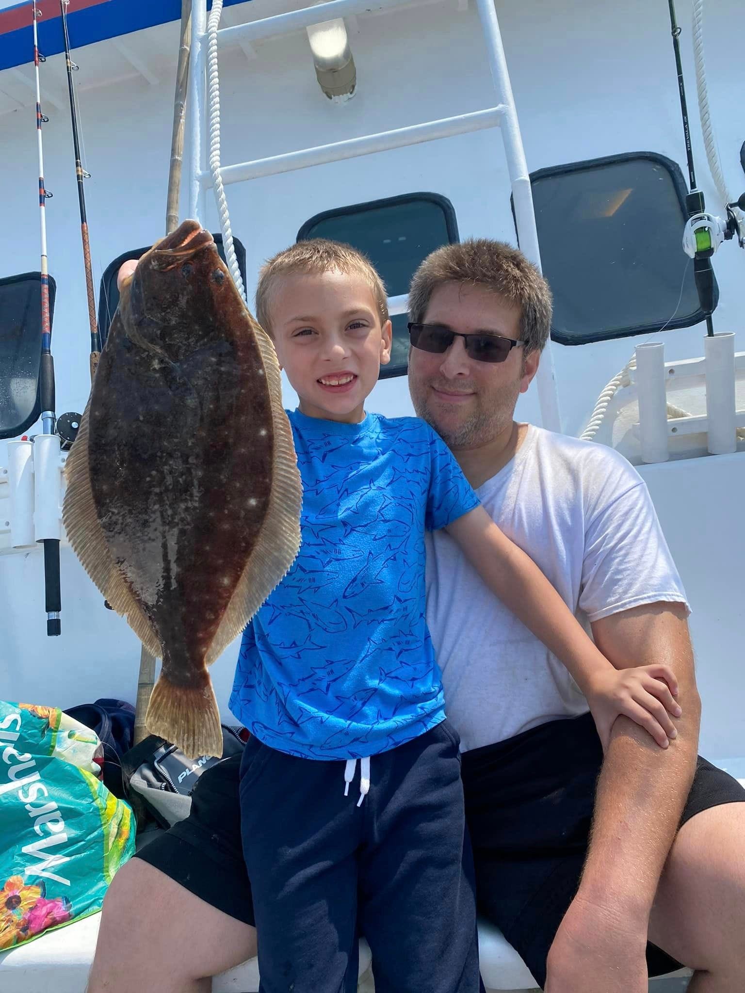 Fishermen wait out storm, find peanut bunker in Manasquan Inlet