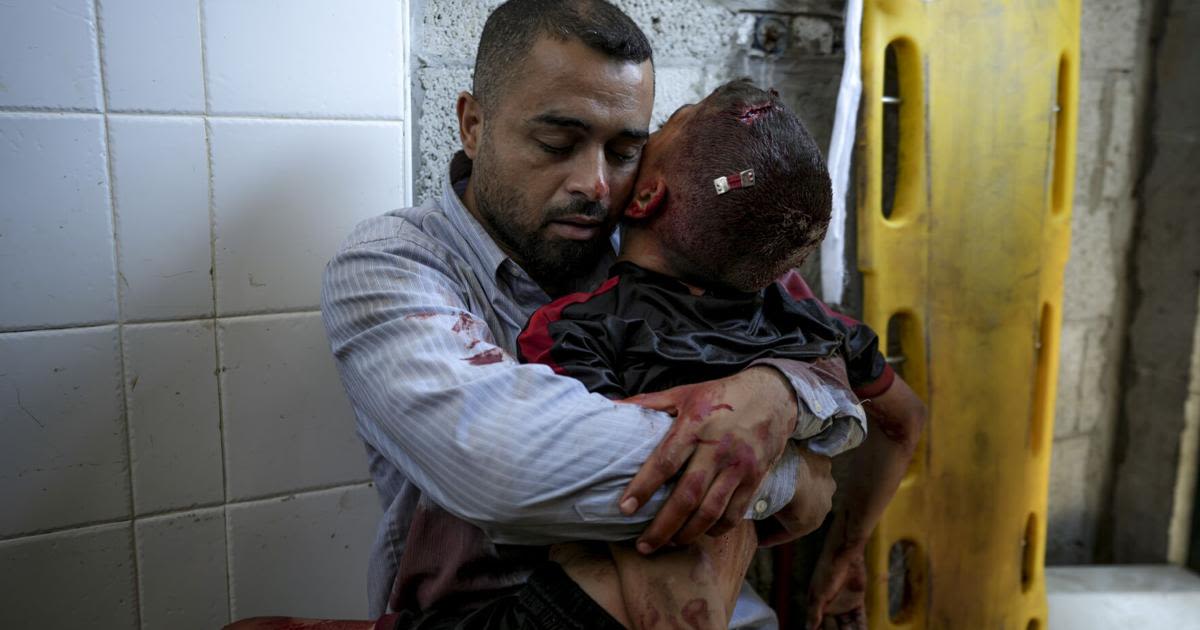 A boy in Gaza was killed by an Israeli airstrike. His father held him and wouldn’t let go