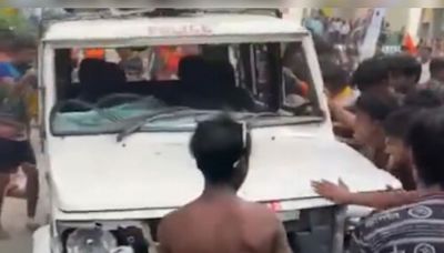 Watch: In UP's Ghaziabad, Kanwariyas damage vehicle with 'police' written on it - CNBC TV18