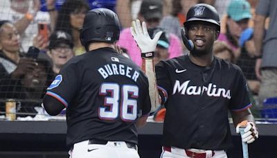 Jake Burger homers and doubles in the Marlins’ 6-4 victory over the Mets