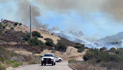 Evacuation warning issued as brush fire threatens homes in Jamul area