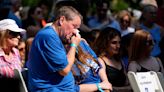 Highland Park residents walk parade route where 7 were killed in Fourth of July shooting