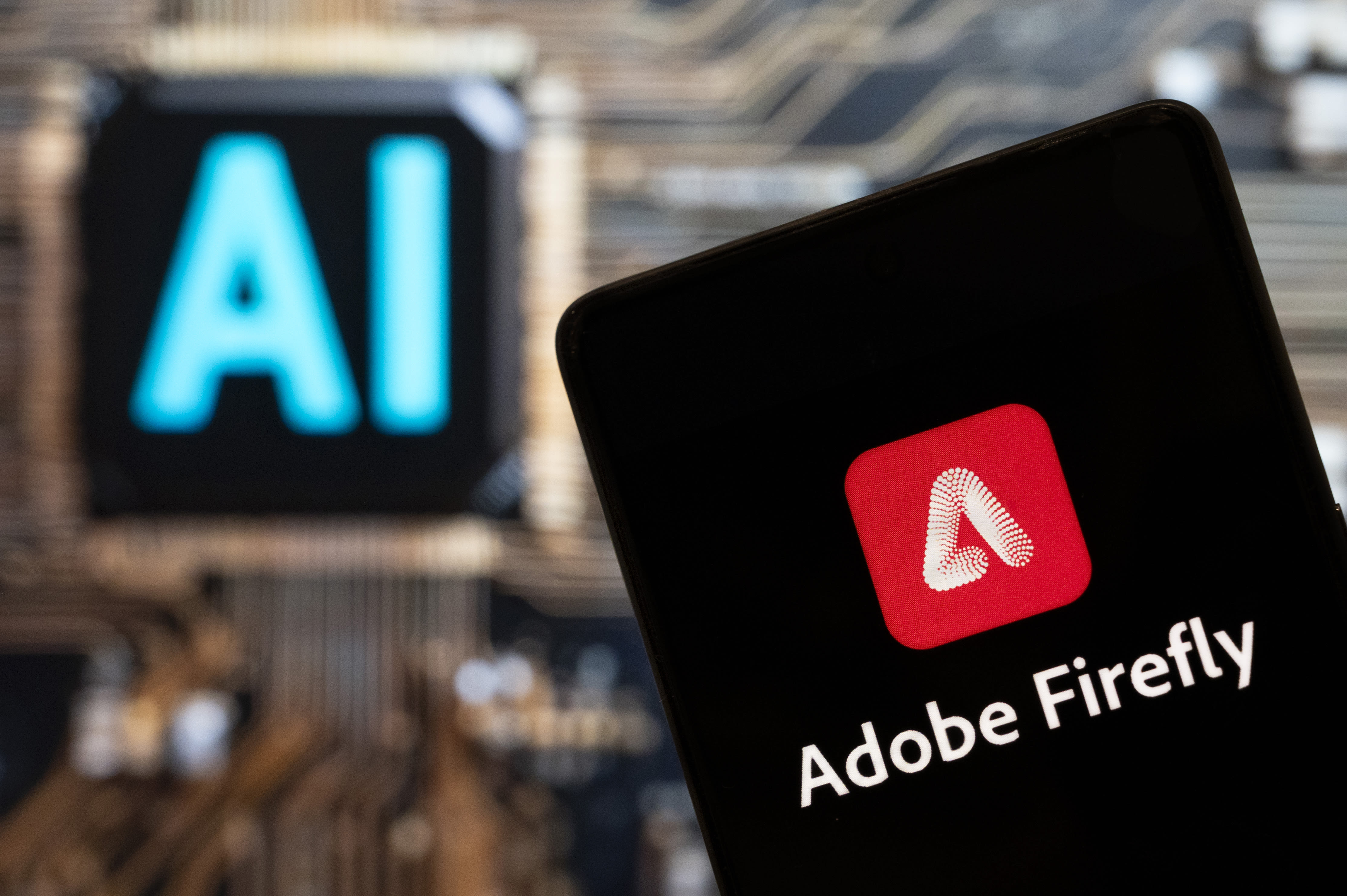 Adobe shares jump after AI-fueled boost to revenue forecast