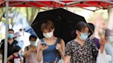 Covid outbreak traps almost 100,000 tourists in Chinese resort