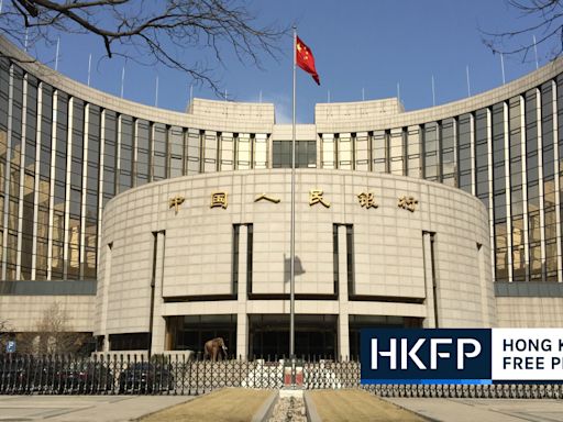 China’s central bank cuts key interest rates to boost lending, kickstart economic growth