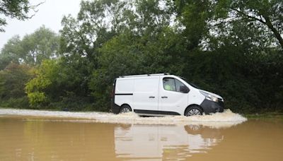 UK weather: Flash floods leave cars underwater as some areas see more than a month's rainfall